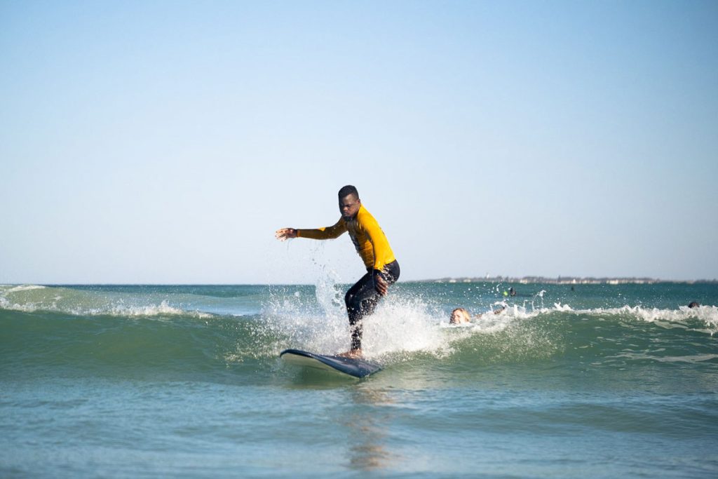 Stoked-Surf man surfing a wave